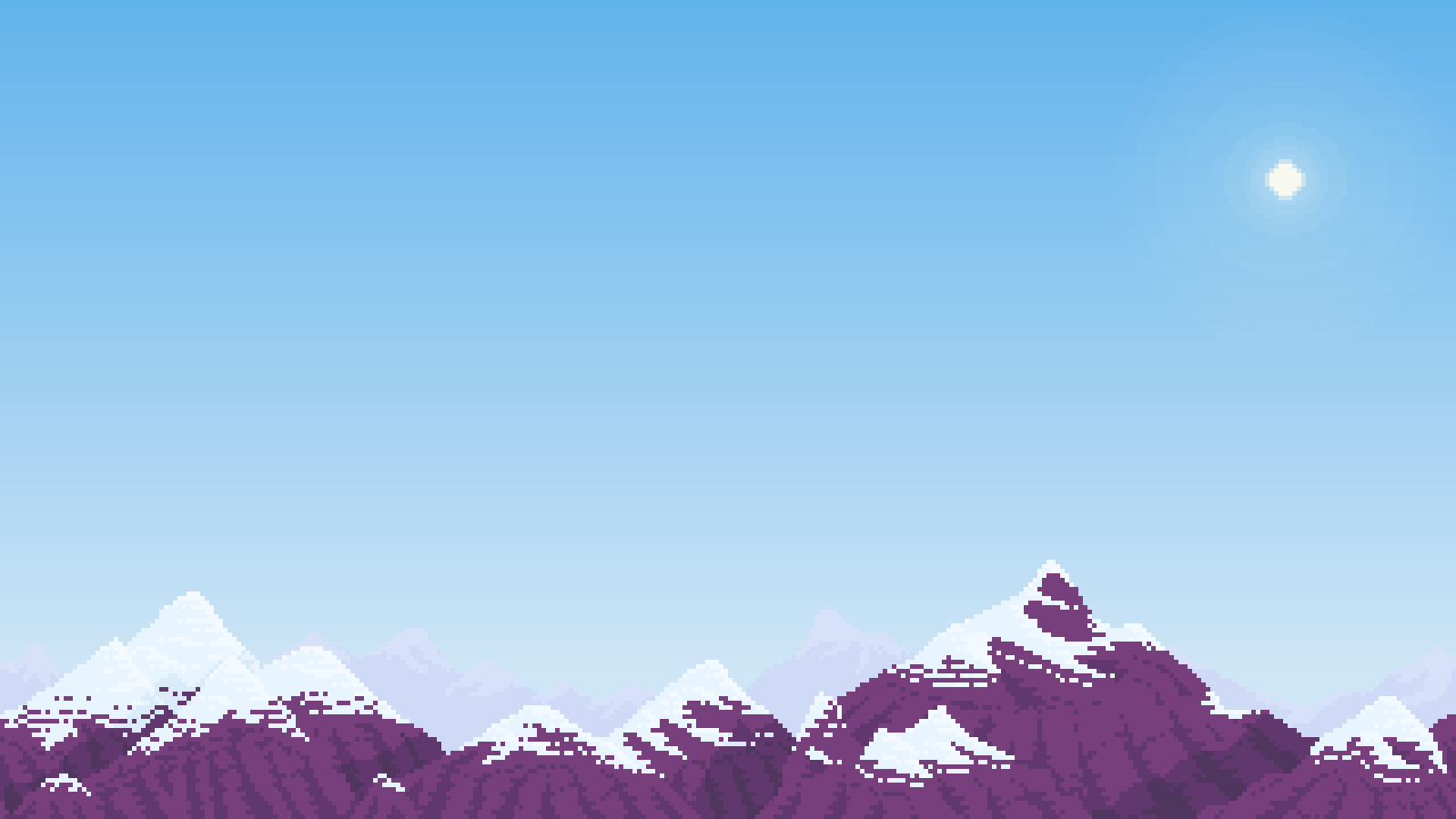 A snowy mountain range with a clear sky